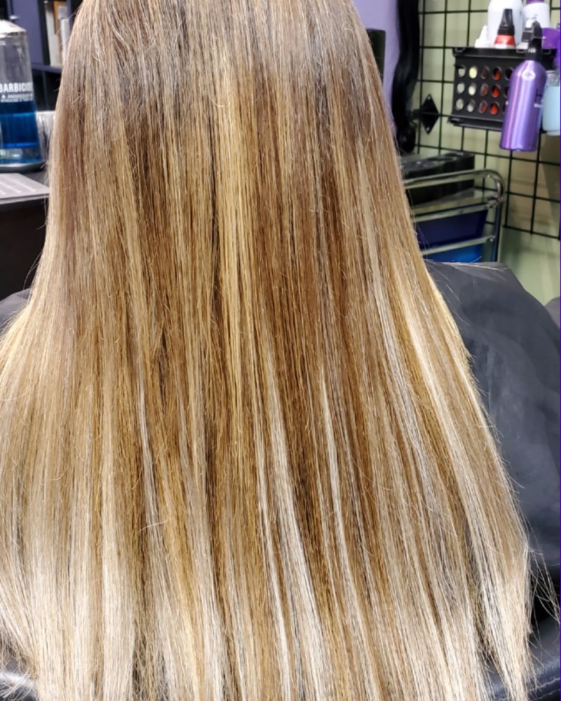 Client hair after Mayte's smoothing and styling service